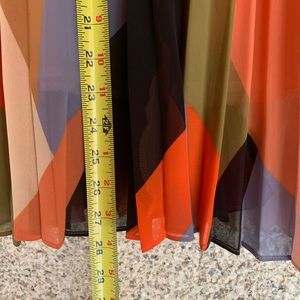 HD in Paris from Anthropologie gorgeous pleated midi skirt.